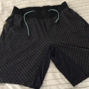 Black with yellow design lulu gym shorts